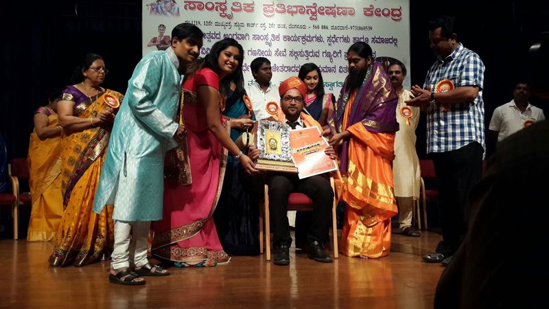Felicitation ceremony on stage